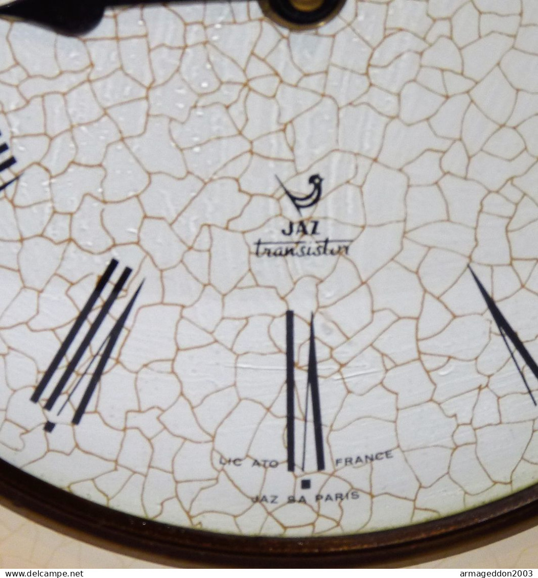 ANCIENNE PENDULE HORLOGE EN TOLE JAZ TRANSISTOR LIC ATO FONCTIONNE - Relojes