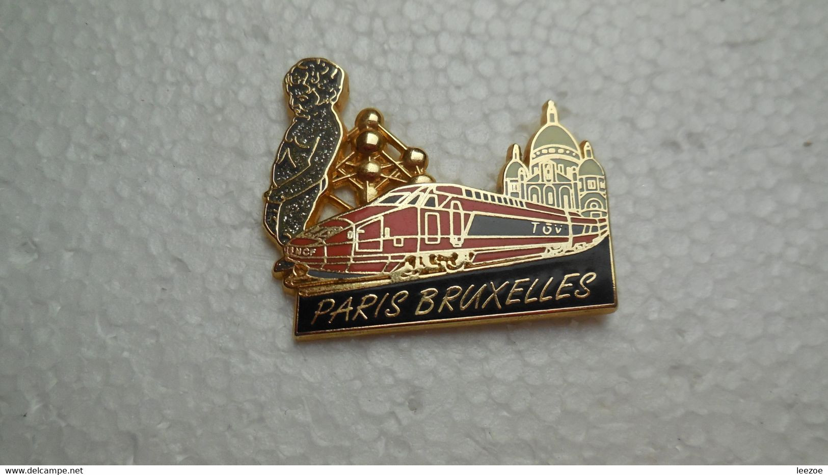 Pin's TGV PARIS BRUXELLES, ATOMIUM, Manneken-pis BALLARD COLLECTION, Doré à L'Or Fin, Tgv Orange.BT26 - TGV