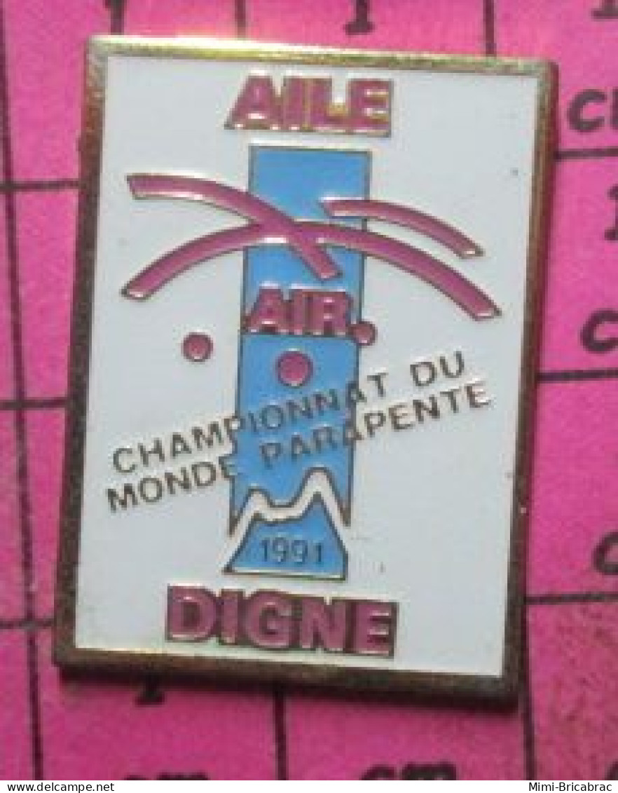 1518A Pin's Pins / Beau Et Rare / SPORTS / PARACHUTISME PARAPENTE AILE AIR DIGNE CHAMPIONNAT DU MONDE DE PARAPENTE - Parachutisme