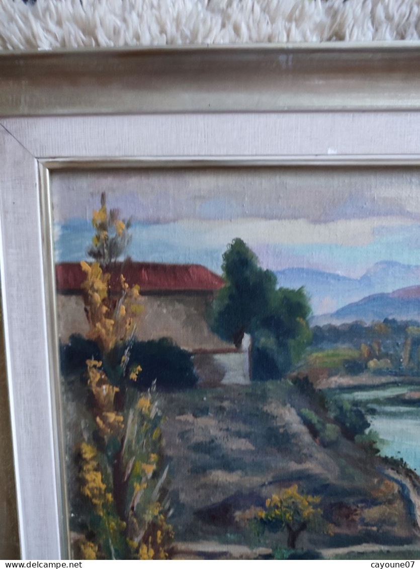 R. SORREL huile sur toile marouflée sur carton "Paysage de montagne rivière et ferme" encadrée