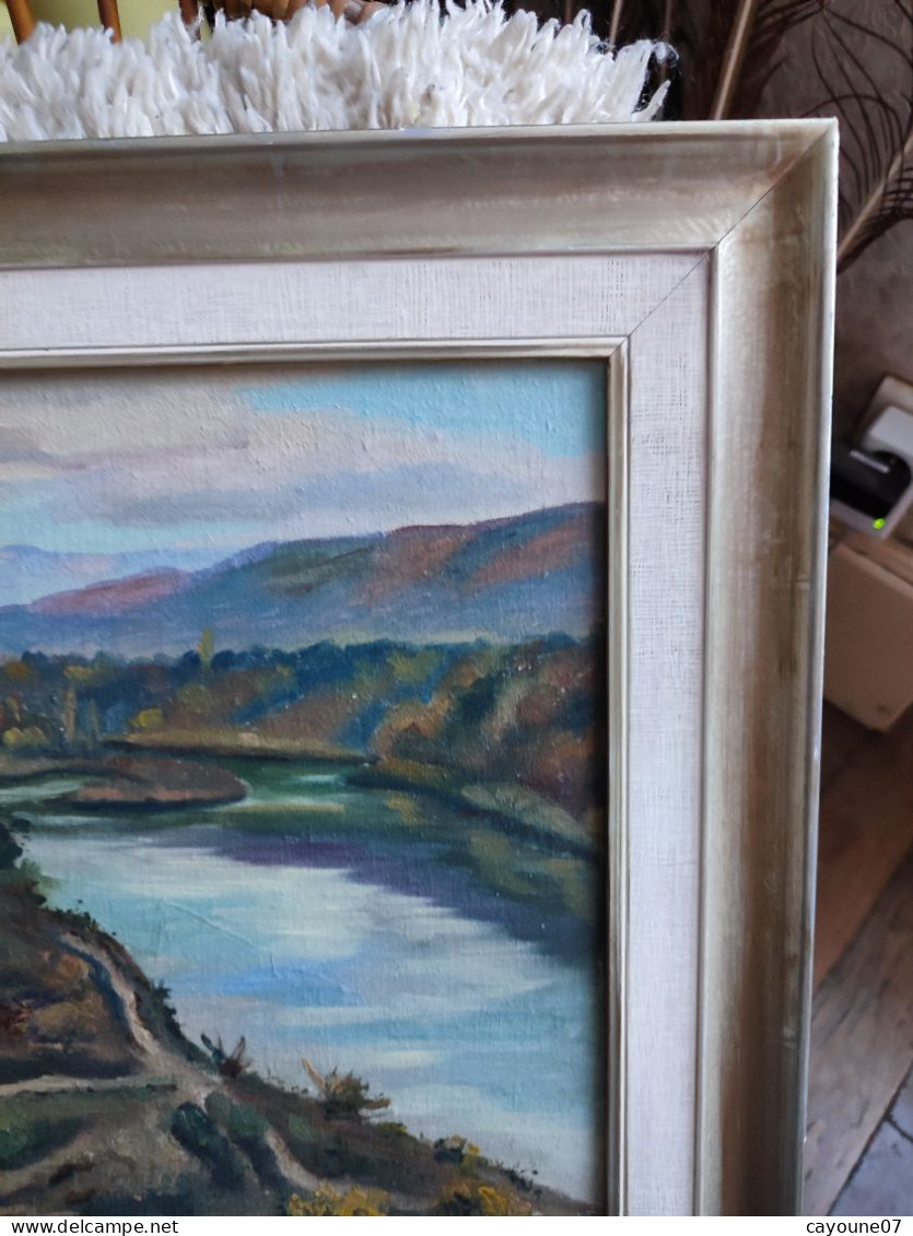 R. SORREL huile sur toile marouflée sur carton "Paysage de montagne rivière et ferme" encadrée