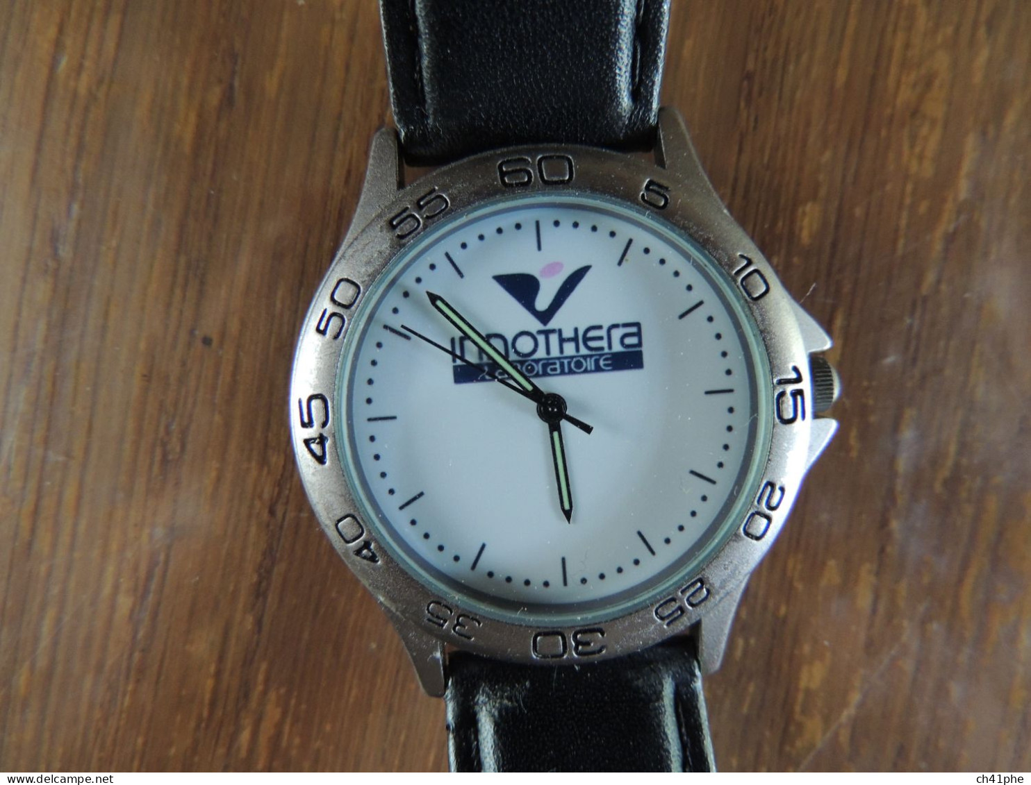 MONTRE POUR LE LABORATOIRE PHARMACEUTIQUE "INNOTHERA" DEBUT DES ANNEES 1990 - ETAT NEUF, VOIR DESCRIPTION - Advertisement Watches