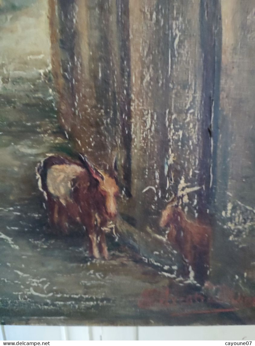 DINO SILVESTRE huile sur toile "Vieille ruelle animée de deux hommes assis et chèvres"