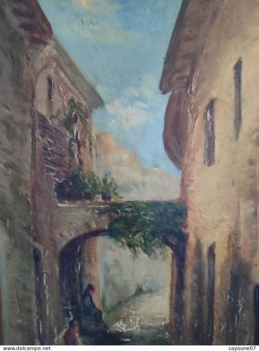 DINO SILVESTRE huile sur toile "Vieille ruelle animée de deux hommes assis et chèvres"