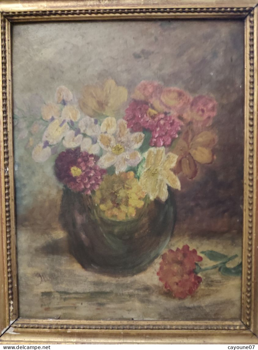 Huile sur carton signée "Nature morte au bouquet de fleurs " cadre bois doré datée 1936