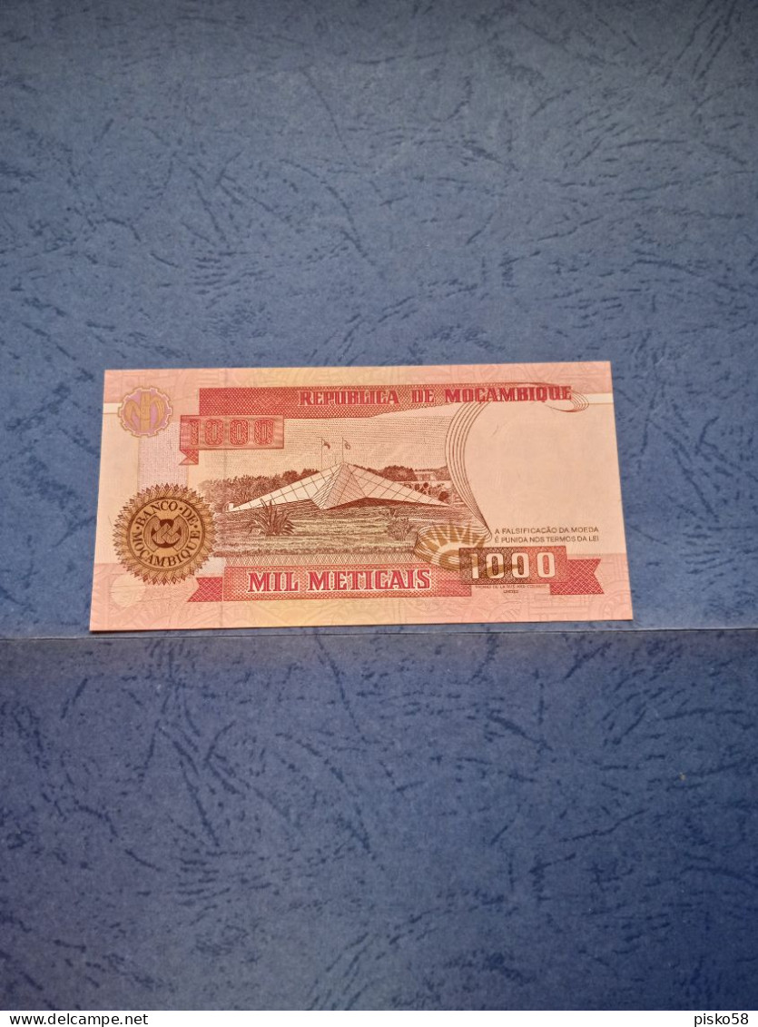 MOZAMBICO-P135 1000M 16.6.1991 UNC - Mozambique