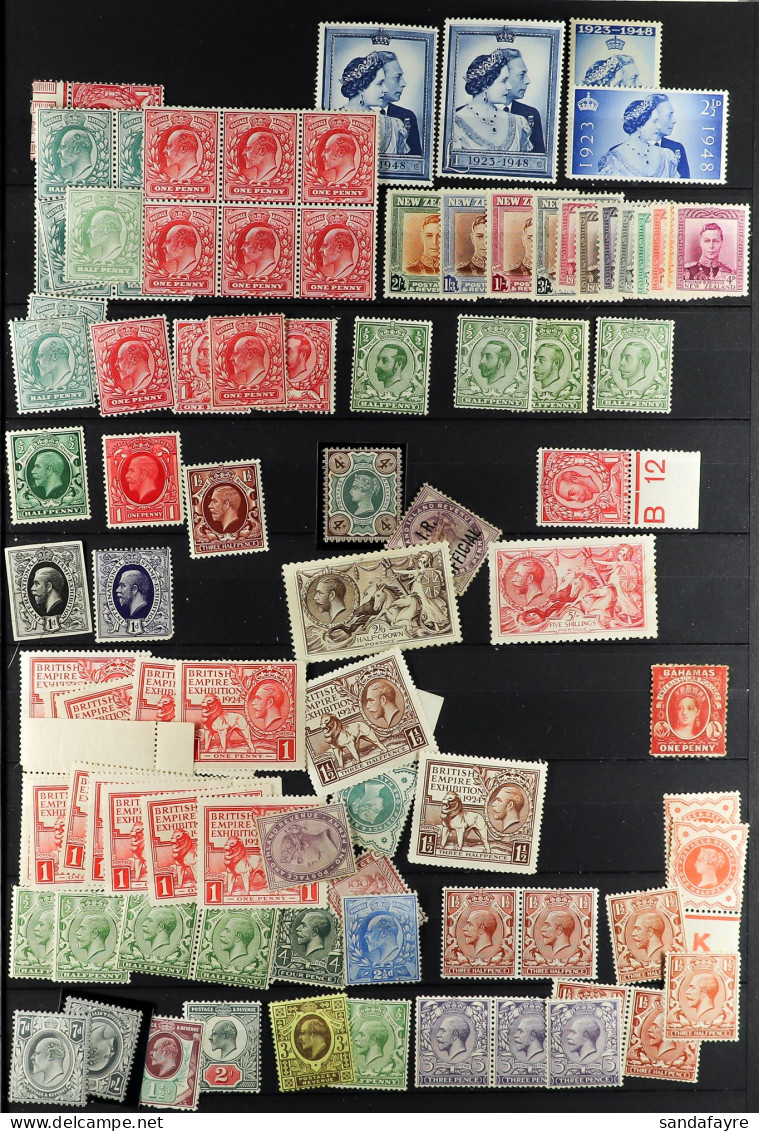 WORLD WIDE IN BIG STOCKBOOK. Contains Mint And Used 1860 - 1990's Collection. Note GB 1948 Â£1 Wedding (x2), Malaya Stat - Other & Unclassified