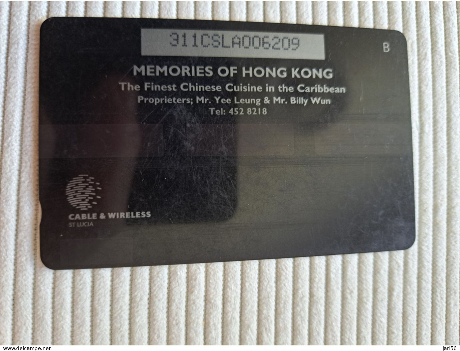 ST LUCIA    $ 20   CABLE & WIRELESS  STL-311A  311CSLA    MEMORIES OF HONG KONG  Fine Used Card ** 15743** - Santa Lucía