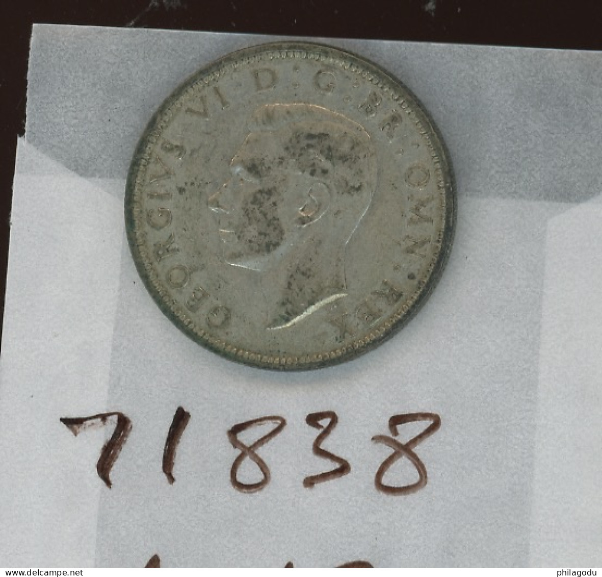 1942  Goerge VI.   Nice Looking Condition - K. 1/2 Crown