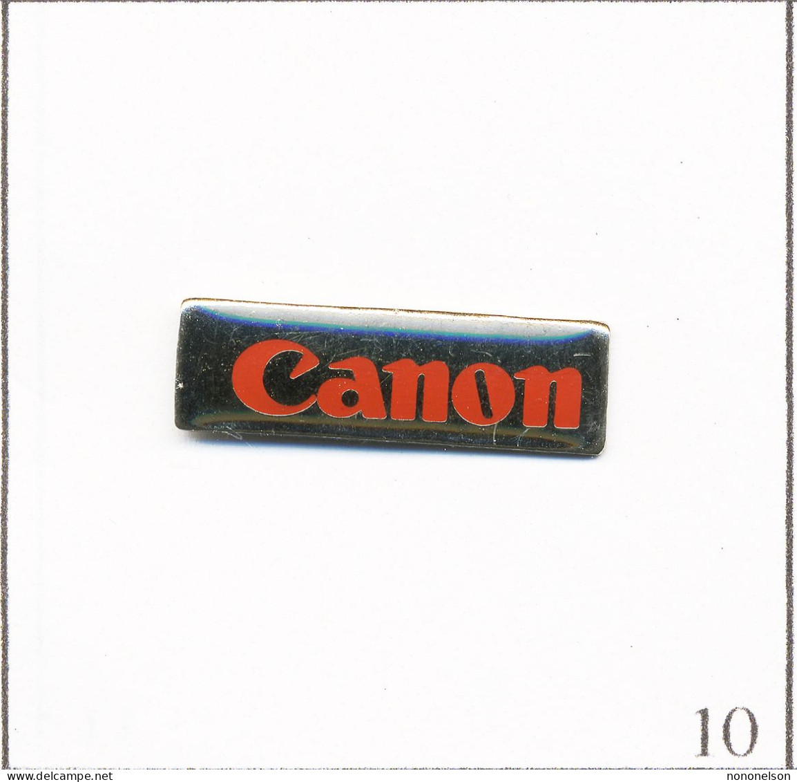 Pin's Photographie - Appareil / Logo De La Marque Canon. Non Estampillé. Epoxy. T712-10 - Photographie