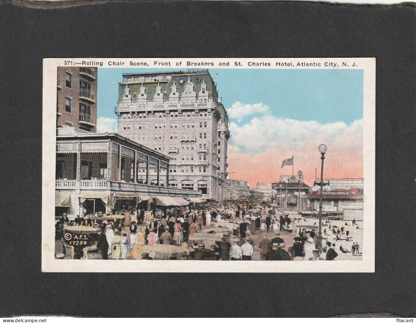 125314     Stati  Uniti,  Rolling  Chair Scene, Front Of Breakers  And  St. Charles Hotel,    Atlantic  City, N. J., NV - Atlantic City