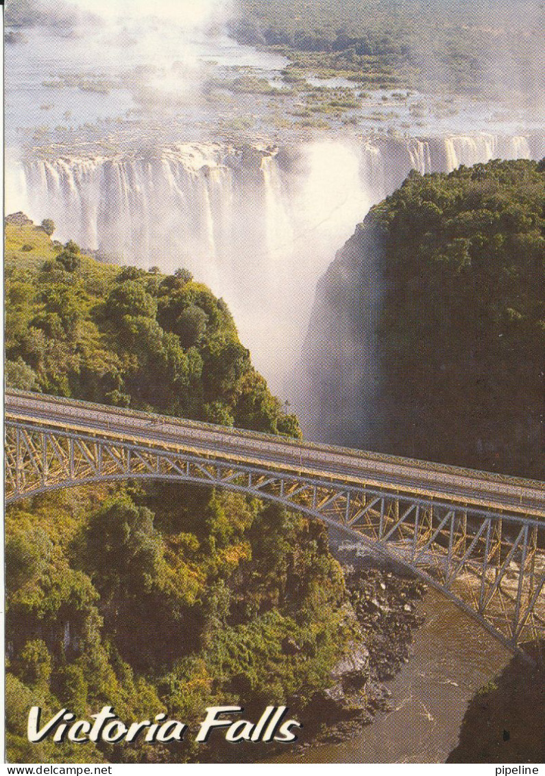 Zimbabwe Postcard Sent To England 24-6-1999 (Victoria Falls Aerial View With Bridge) - Simbabwe