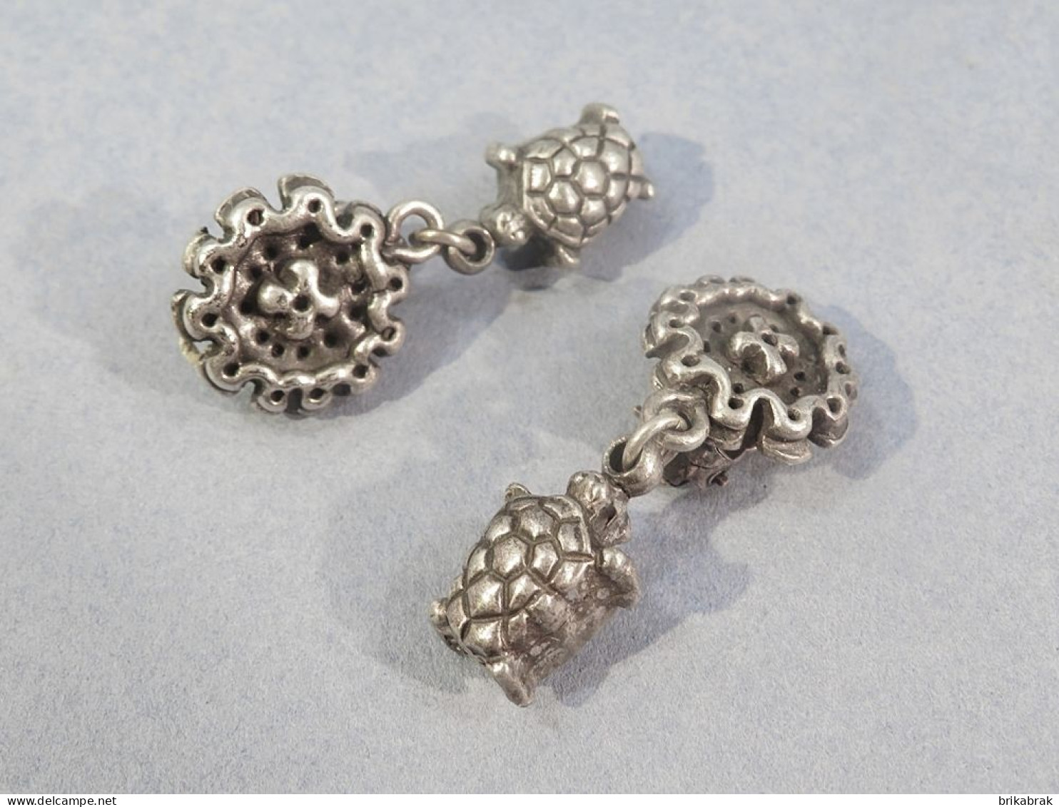 BOUCLES D'OREILLES TORTUES EN METAL ARGENTE - Orecchini