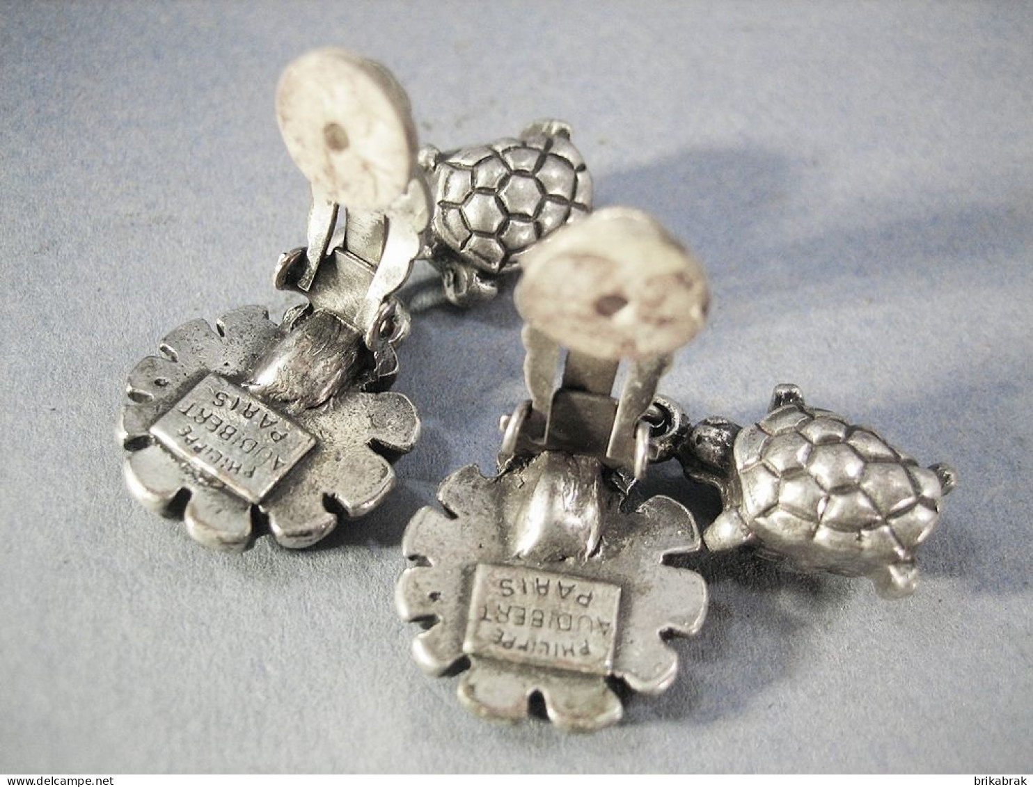 BOUCLES D'OREILLES TORTUES EN METAL ARGENTE