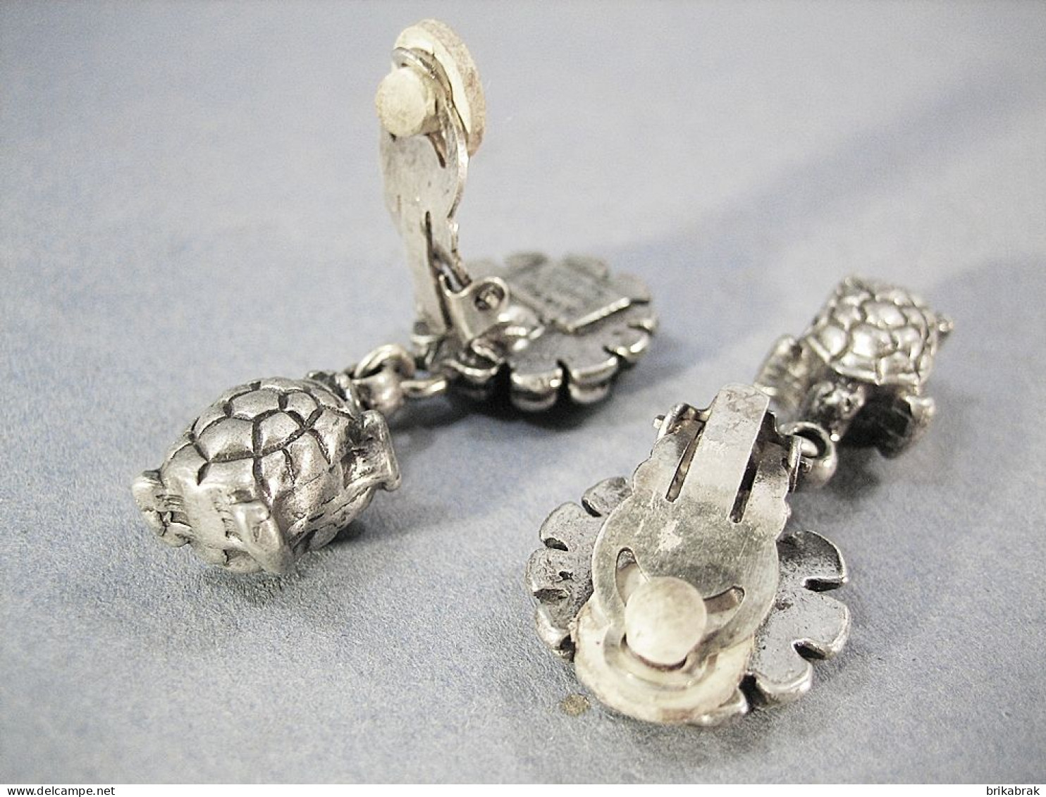 BOUCLES D'OREILLES TORTUES EN METAL ARGENTE