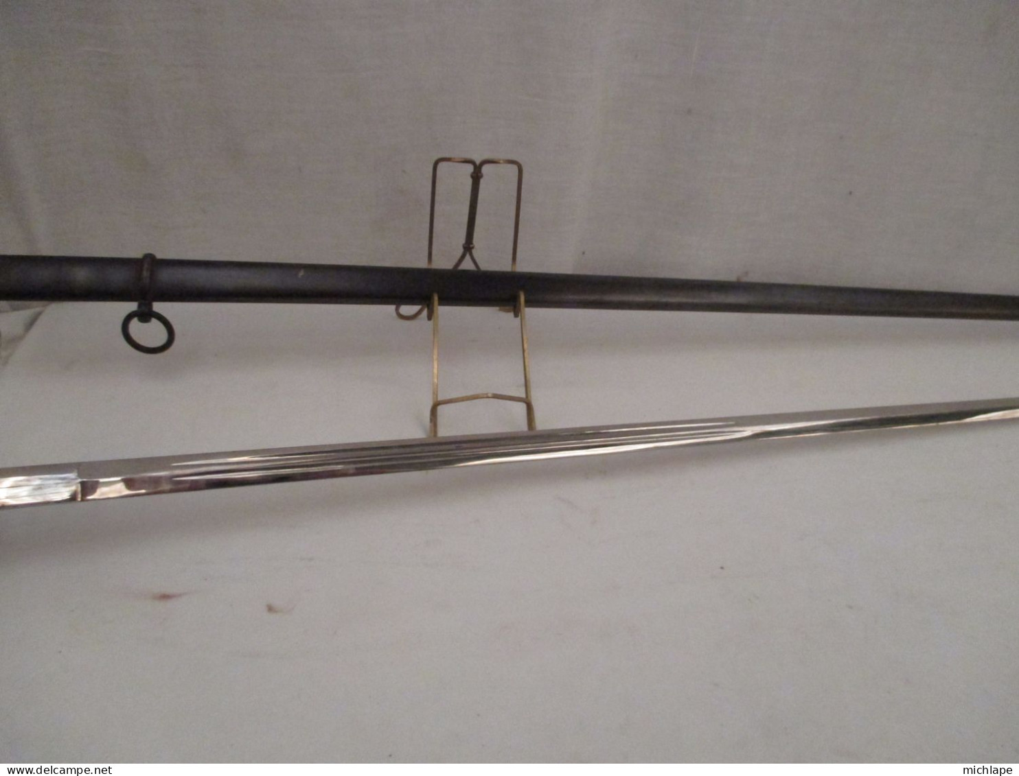 épée de sous  officier - L. total 106 cm marquée Couleau a Kligenthal superbe  lame de 90 cm 950 Gr - vendue  en l'état