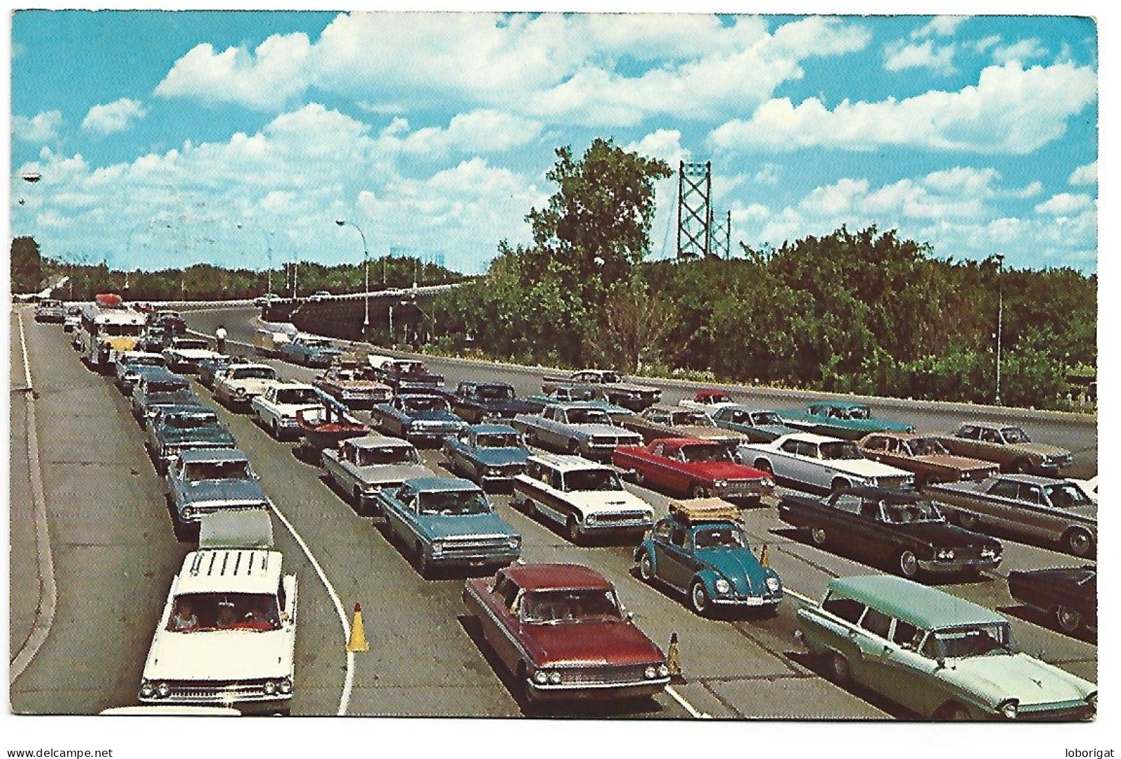 MOTOR TRAFFIC ON THE AMBASSADOR BRIDGE ENTERING CANADA.- " CANADA'S ROSE CITY ".- WINDSOR.-  ONTARIO.-  ( CANADA ) - Windsor