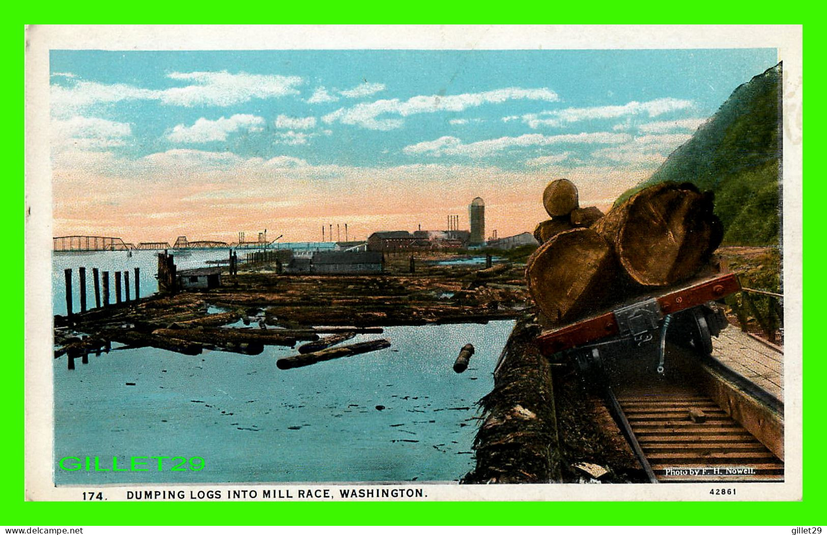 TACOMA, WASHINGTON - DUMPING LOGS INTO MILL RACE - PHOTO BY F. H NOWELL - PUB BY LELAND LUND - - Tacoma