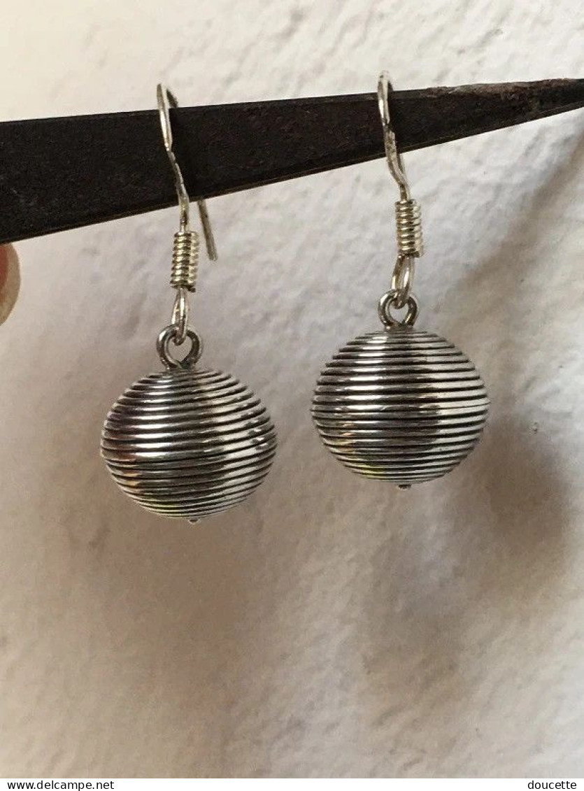 boucles d'oreilles en argent massif