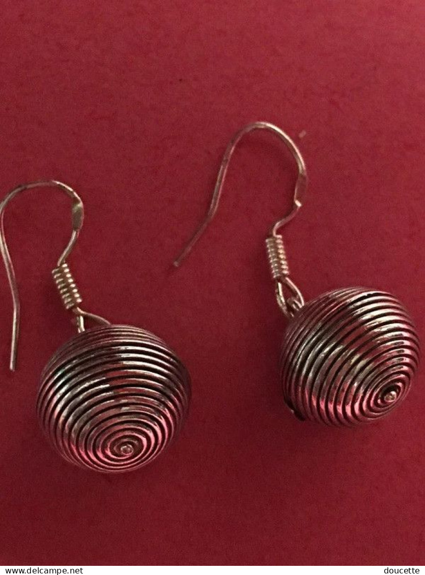 boucles d'oreilles en argent massif