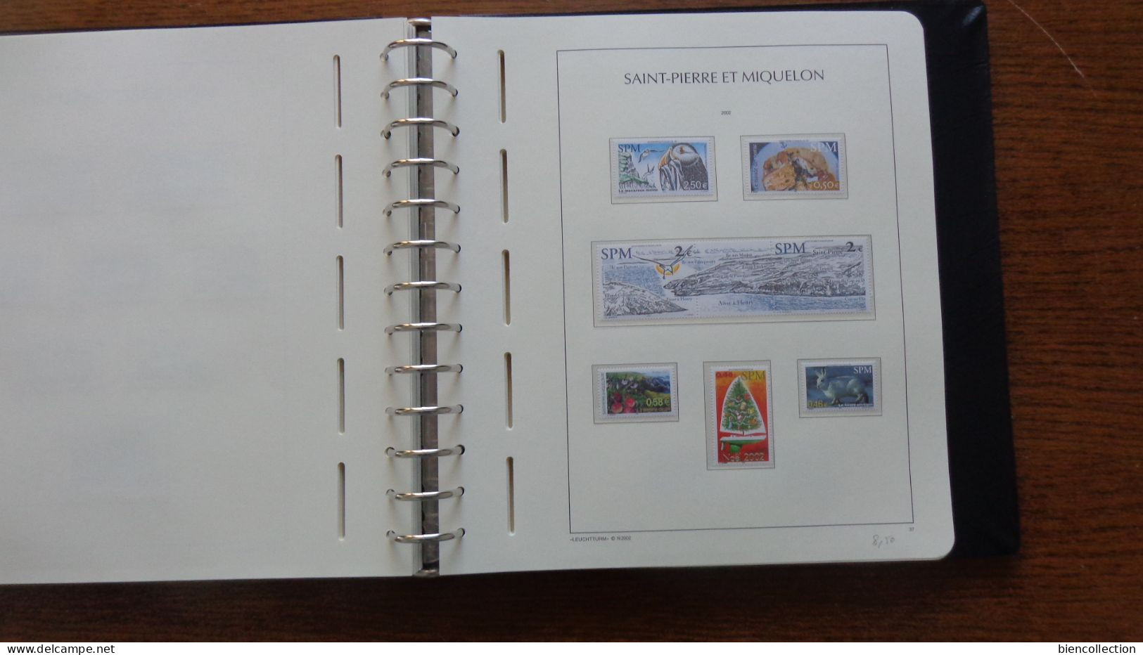 Saint Pierre et Miquelon. Collection** complète de 1986 à 2008 dans un album Leuchturn; faciale 330€