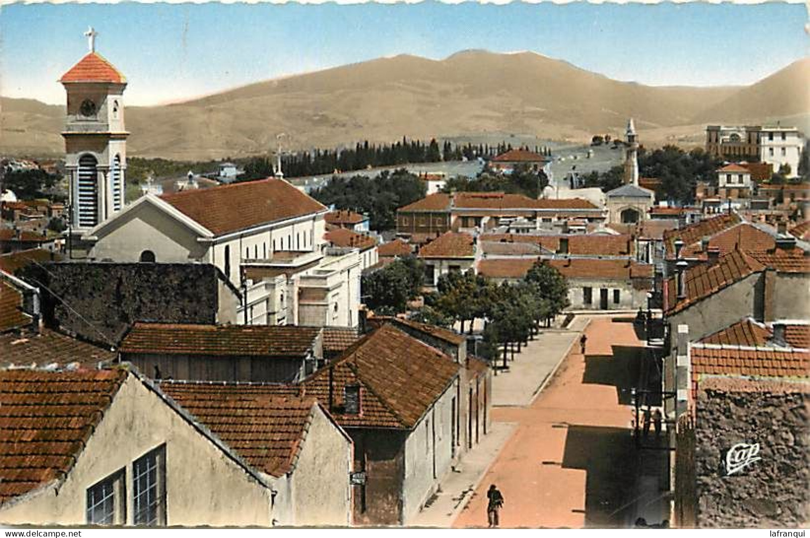 Pays Div-ref DD719- Algerie - Souk Ahras - Vue Sur L Eglise Et Sur La Mosquée-/ A Circulé En 1959 - - Souk Ahras
