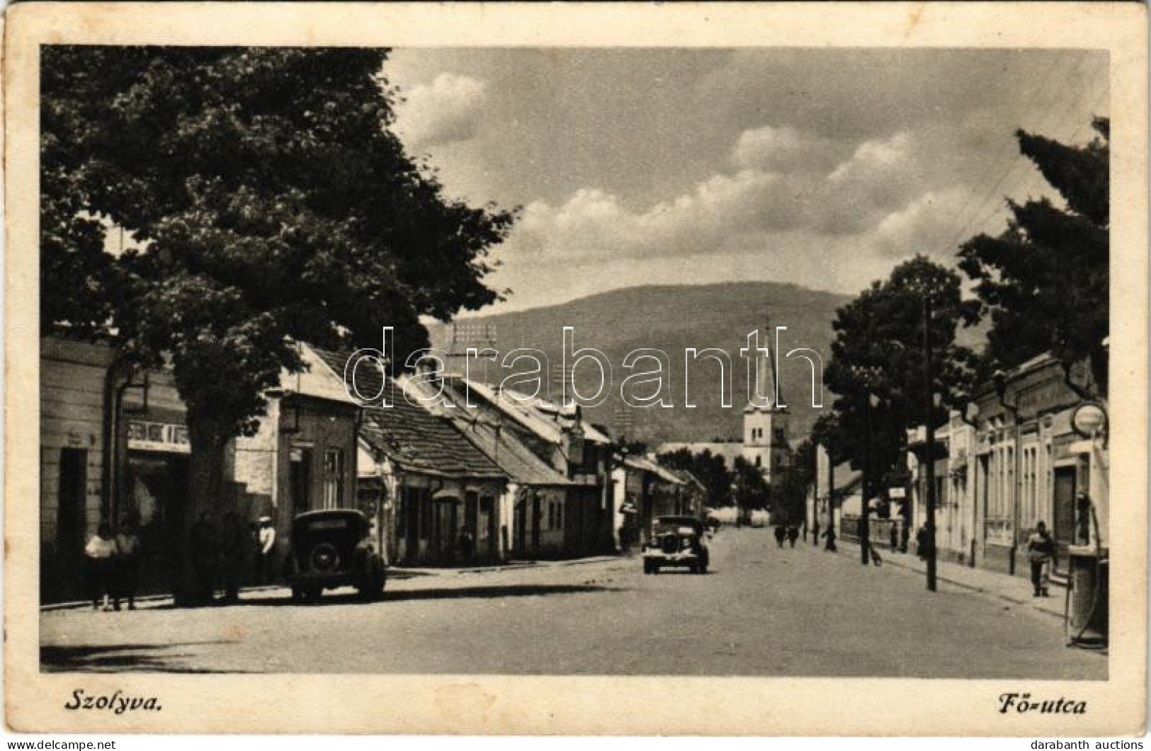 T2/T3 1943 Szolyva, Svalava, Svaljava, Szvaljava, Svaliava; Horthy Miklós Utca, Autók, üzletek, Templom / Main Street, A - Non Classés