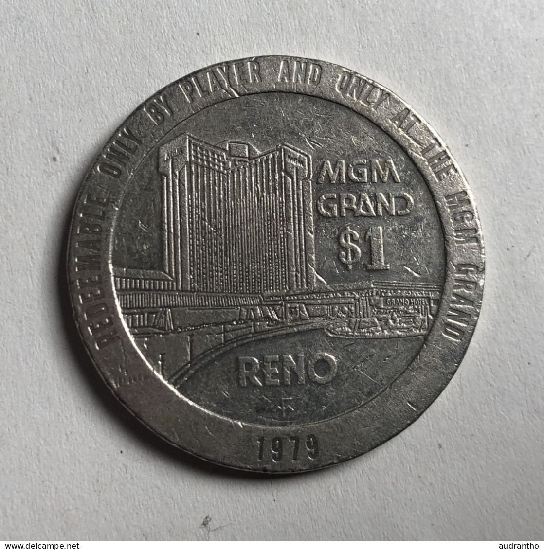 Jeton Etats-Unis - 1 Dollar Gaming Token - MGM Grand Casino RENO 1979 - Other & Unclassified