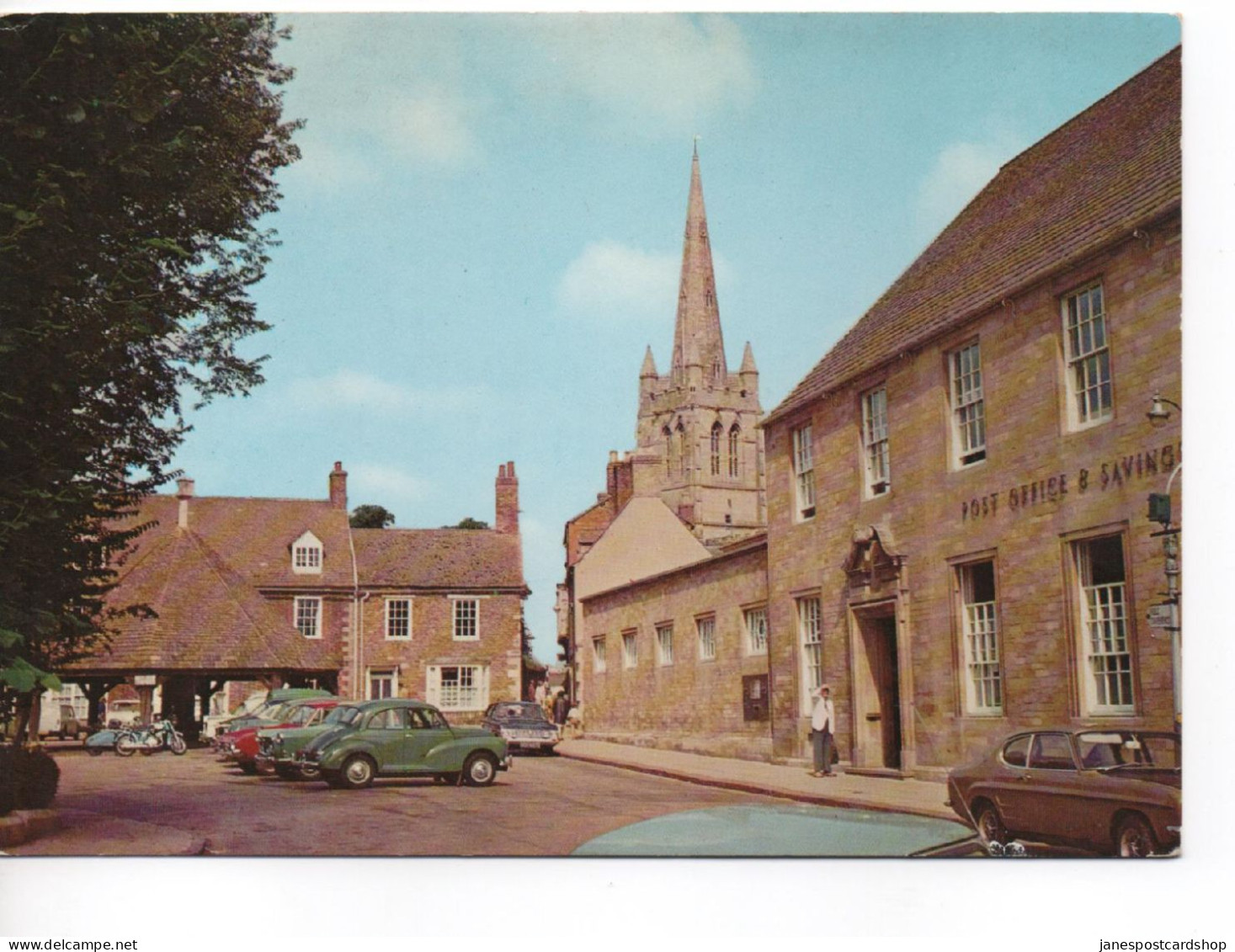 THE STOCKS AND CHURCH - OAKHAM - RUTLAND WITH VARIOUS VINTAGE CARS - MORRIS MINOR - FORD CAPRI ETC - Rutland