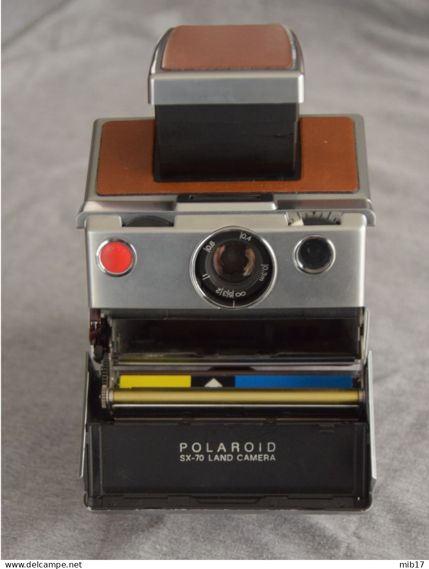 ancien appareil photo POLAROID SX 70 deluxe année 1976 avec facture/notice/attestation douane et sacoche