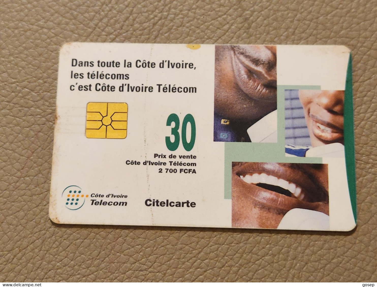 Ivory Coast-CI-CIT-0030B)-people On Telephones-(25)-(30units)-(0001674662)-(tirage-?)-used Card+1card Prepiad Free - Ivoorkust