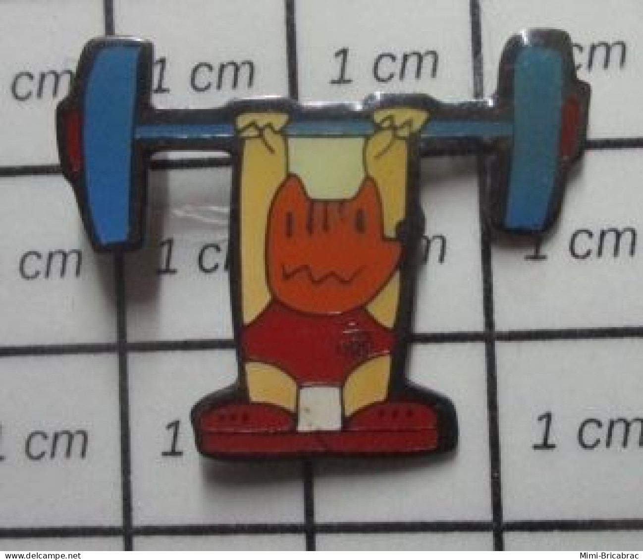 617 Pin's Pins / Beau Et Rare / SPORTS / HALTEROPHILIE JEUX OLYMPIQUES 1992 BARCELONE MASCOTTE COBI - Halterofilia