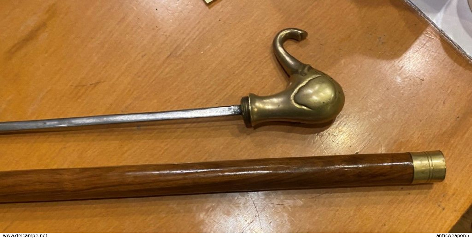 A Cane With A Pike Inside And A Heavy Brass Handle In The Shape Of An Elephant's Head. Europe. Around 1940. (H311) - Armes Blanches