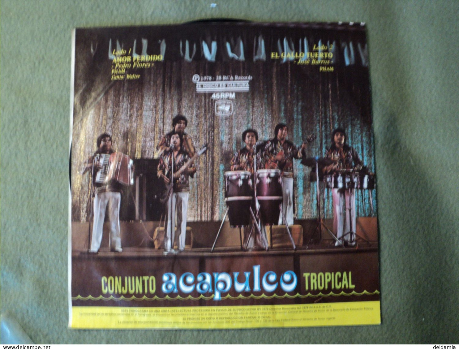 45 TOURS CONJUNTO ACAPULCO TROPICAL. 1978. RCA VICTOR 5032 DU FILM NOCHES DE CABARET. AMOR PERDIDO / EL GALLO TUERTO - Musiche Del Mondo