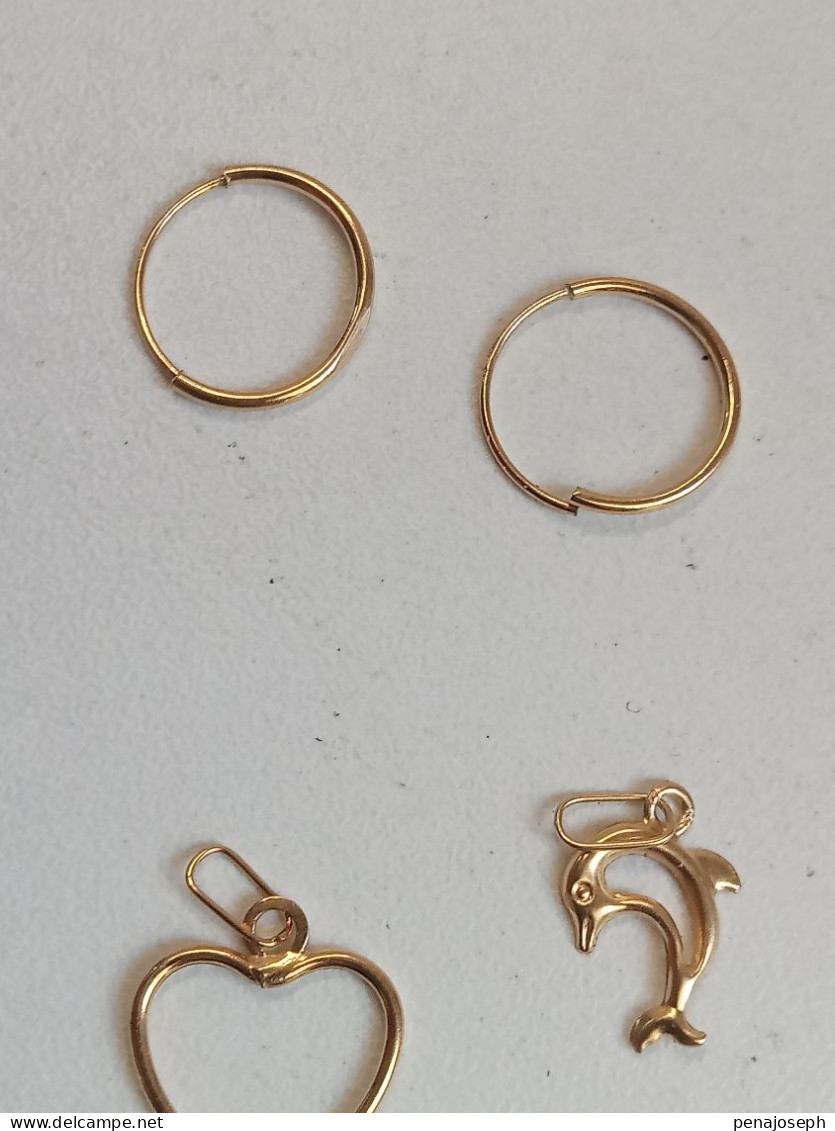 ensemble pendentif boucle d'oreille en or 18 carats