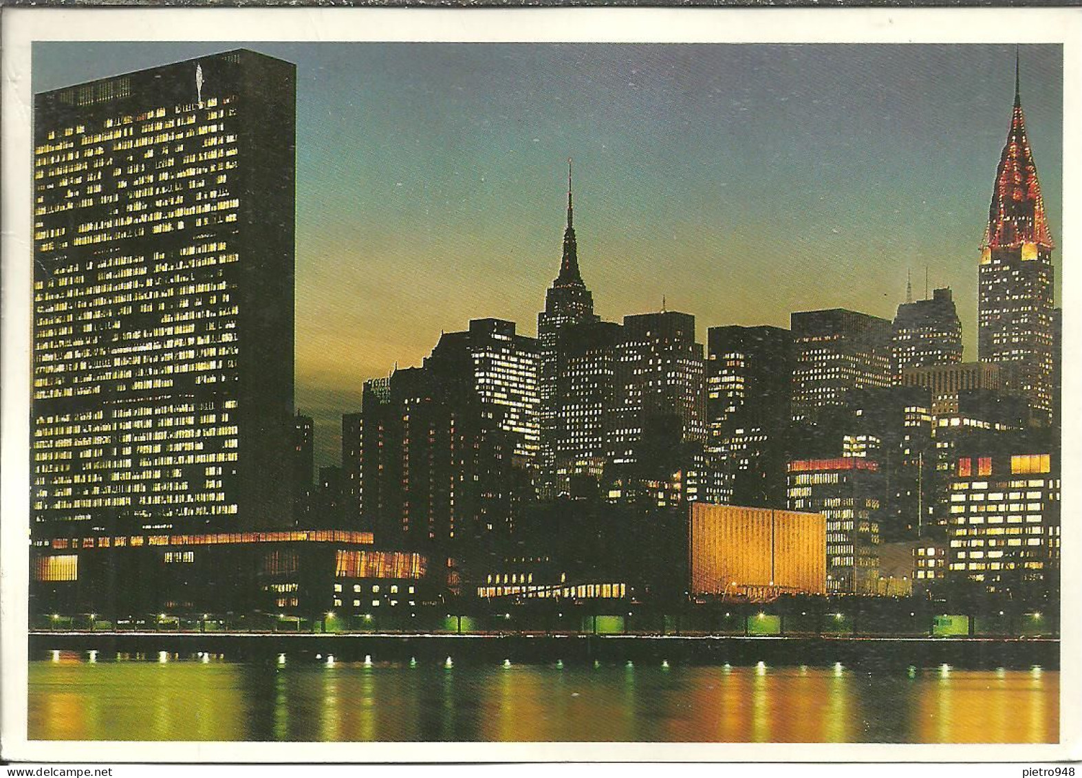 New York City (N.Y., USA) United Nations Building With Empire State Building And Chrysler Building At Night - Chrysler Building