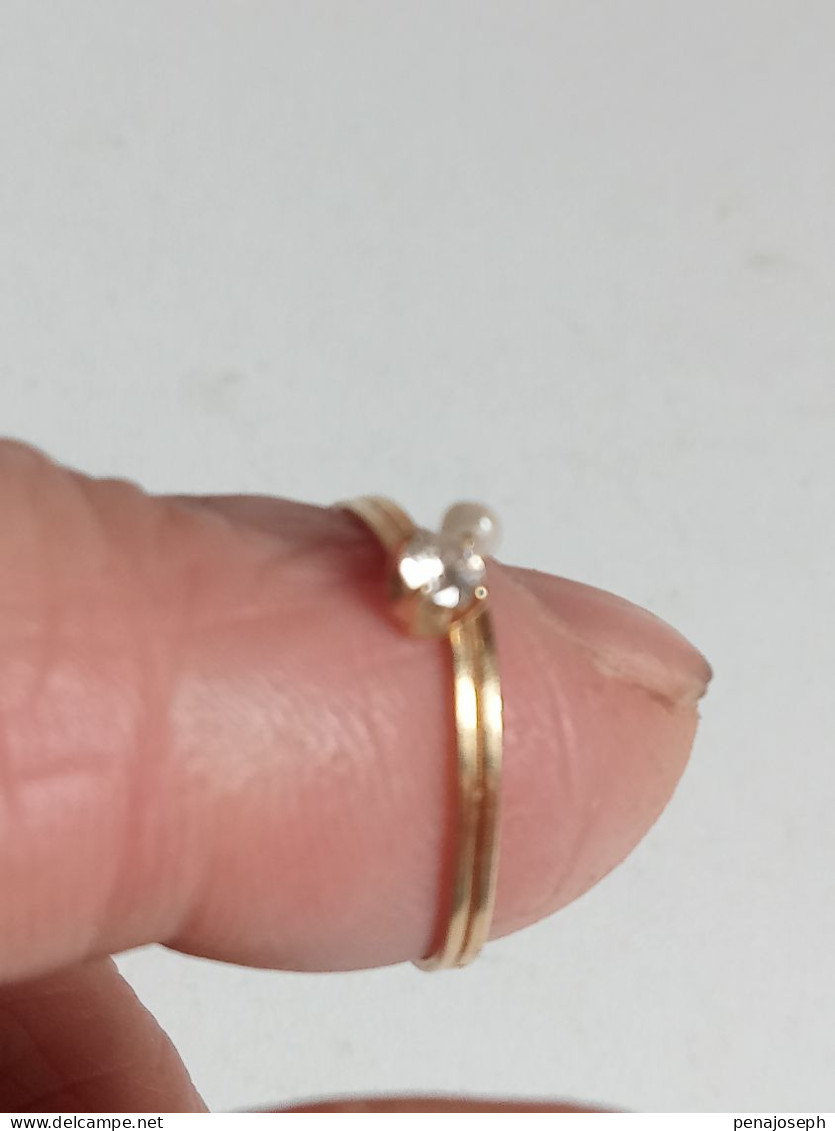 bague or 18 carats avec diamant et perle diamètre 16 mm interieur