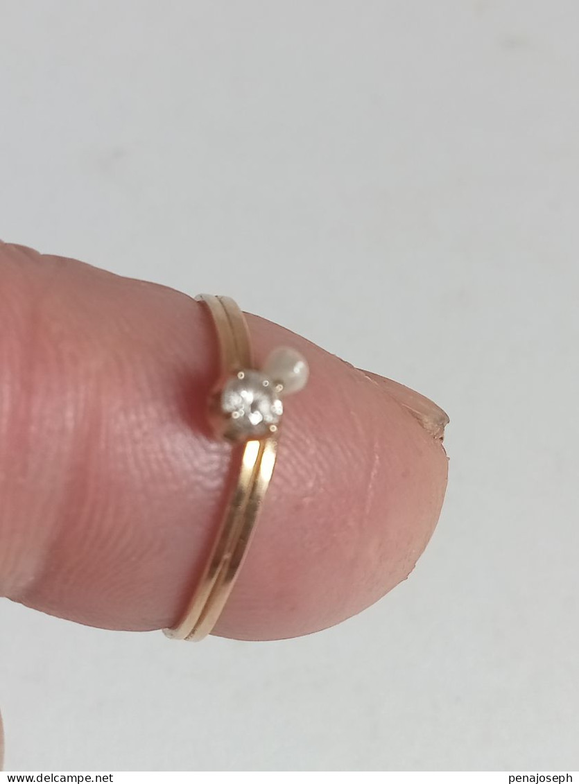 bague or 18 carats avec diamant et perle diamètre 16 mm interieur