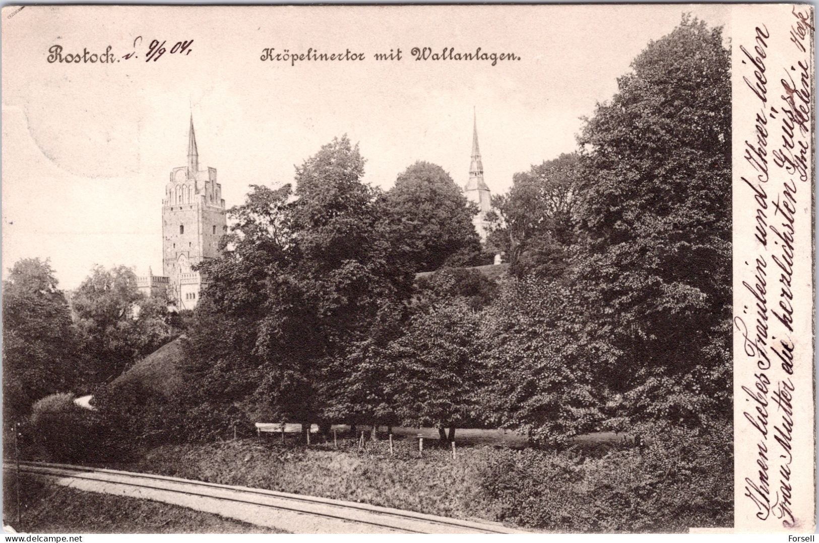 Rostock , Kröpelinertor Mit Wallanalagen (mit Eisenbahn) (Stempel: Rostock 1904) - Rostock
