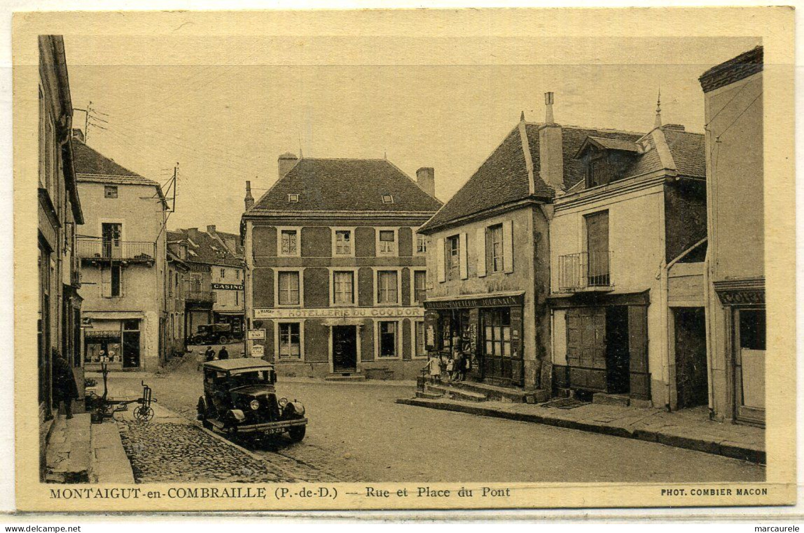 Cpa  Montaigut En Combraille (63)  Rue Et Place Du Pont,  Animée - Montaigut