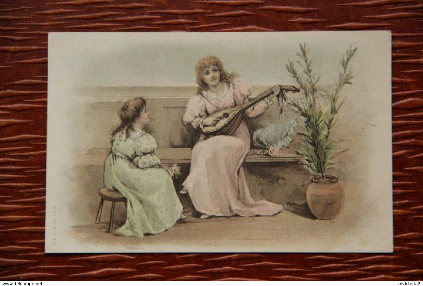 MUSIQUE : Femme Jouant De La Guitare Pour Sa Fille - Music And Musicians