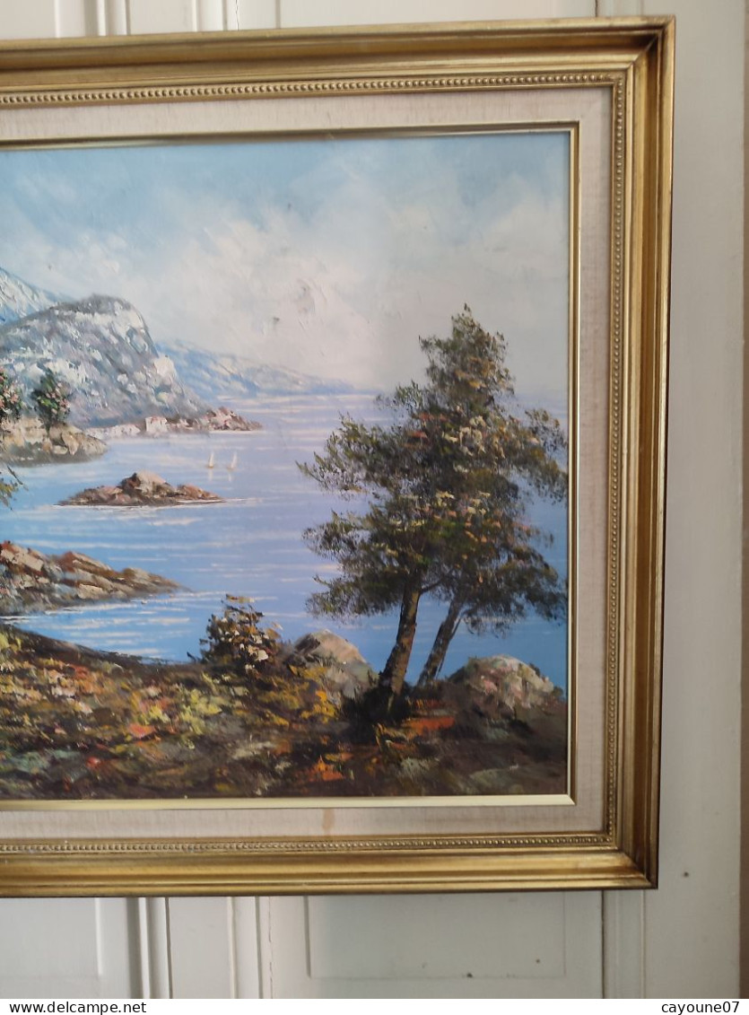 P.SARDLIC (XXème) " Bord de mer côte d'azur" huile sur toile cadre bois doré