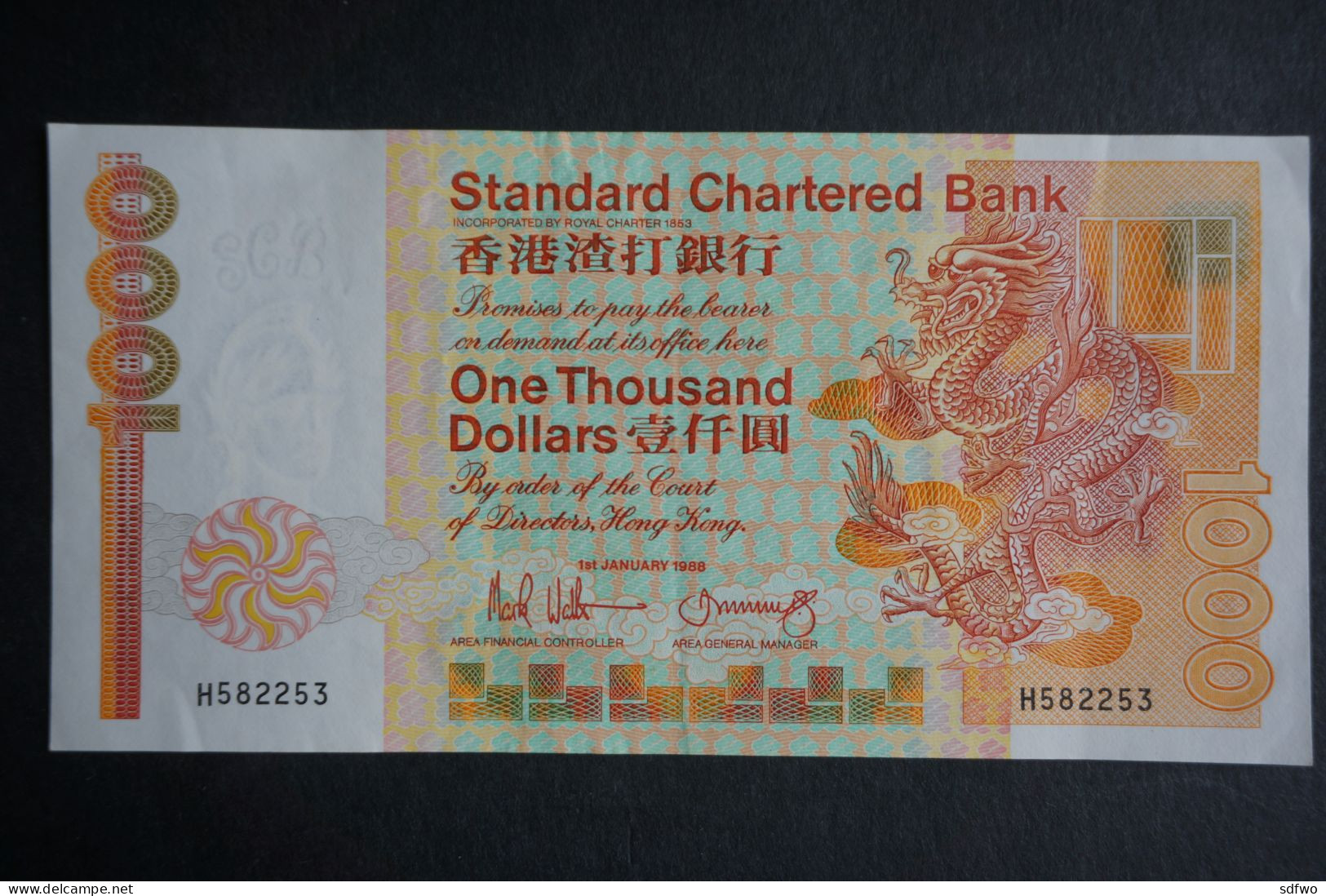 (Tv) 1988 HONG KONG OLD ISSUE - STANDARD CHARTERED BANK 1000 DOLLARS #H582253 - Hong Kong
