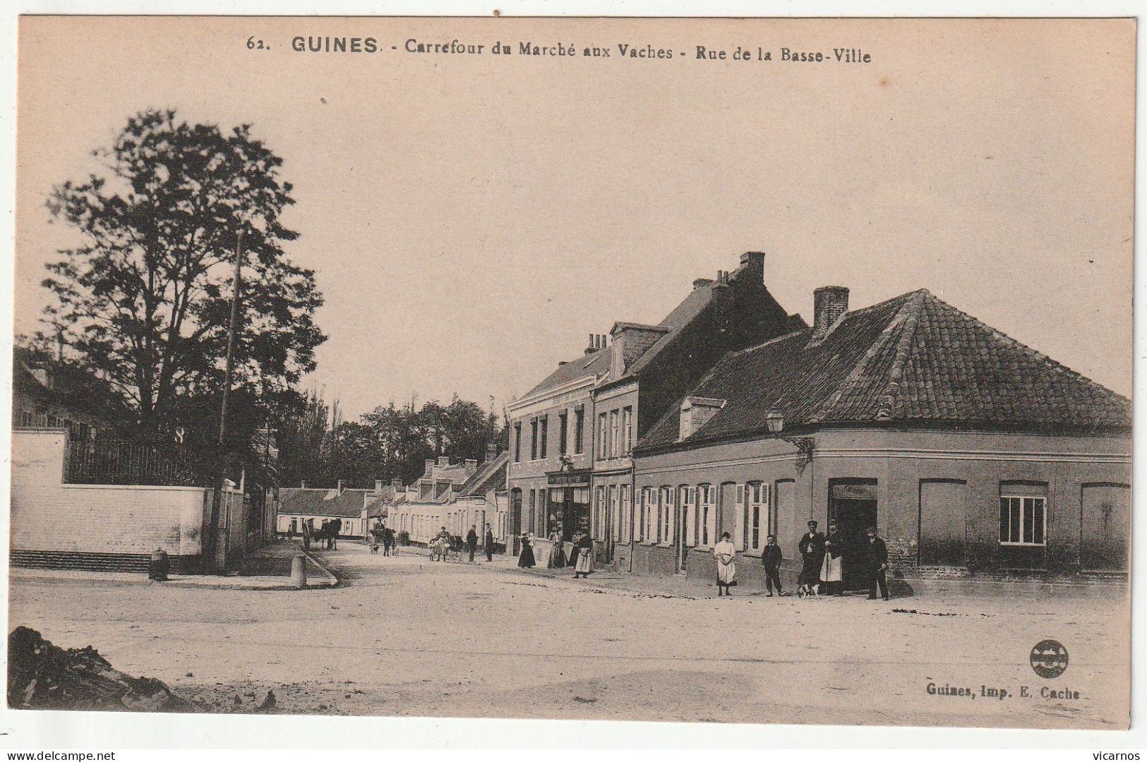 CP 62 GUINES Carrefour De Marché Aux Vaches Rue De La Basse Ville - Guines