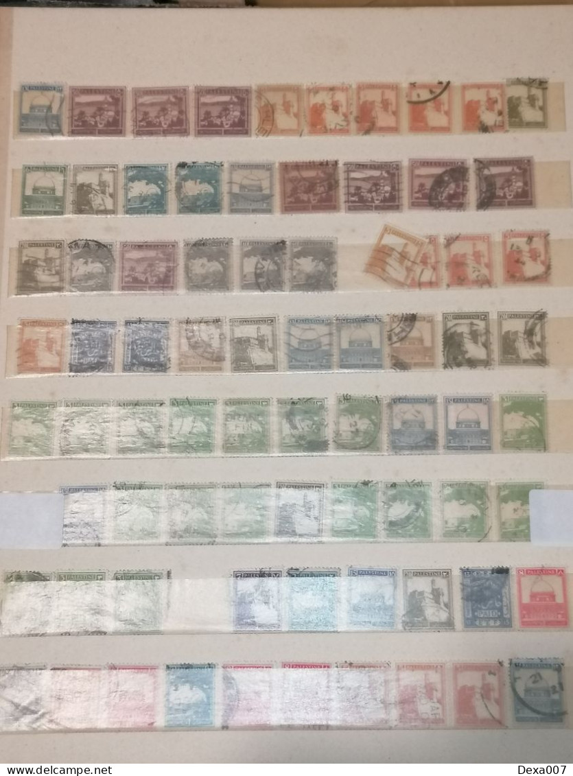 Ancient old album with old stamps Africa, Asia, Europe, America including Egypt, Palestine and colonies used and mint