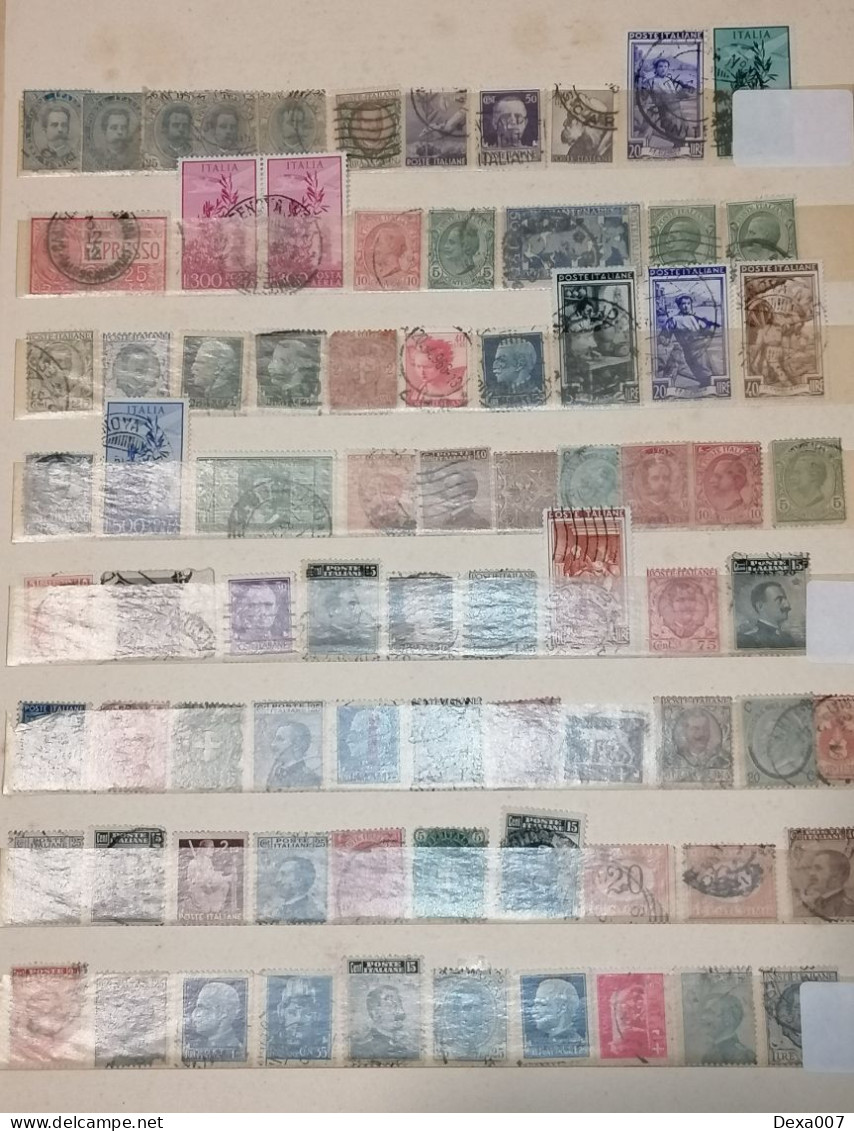 Ancient old album with old stamps Africa, Asia, Europe, America including Egypt, Palestine and colonies used and mint