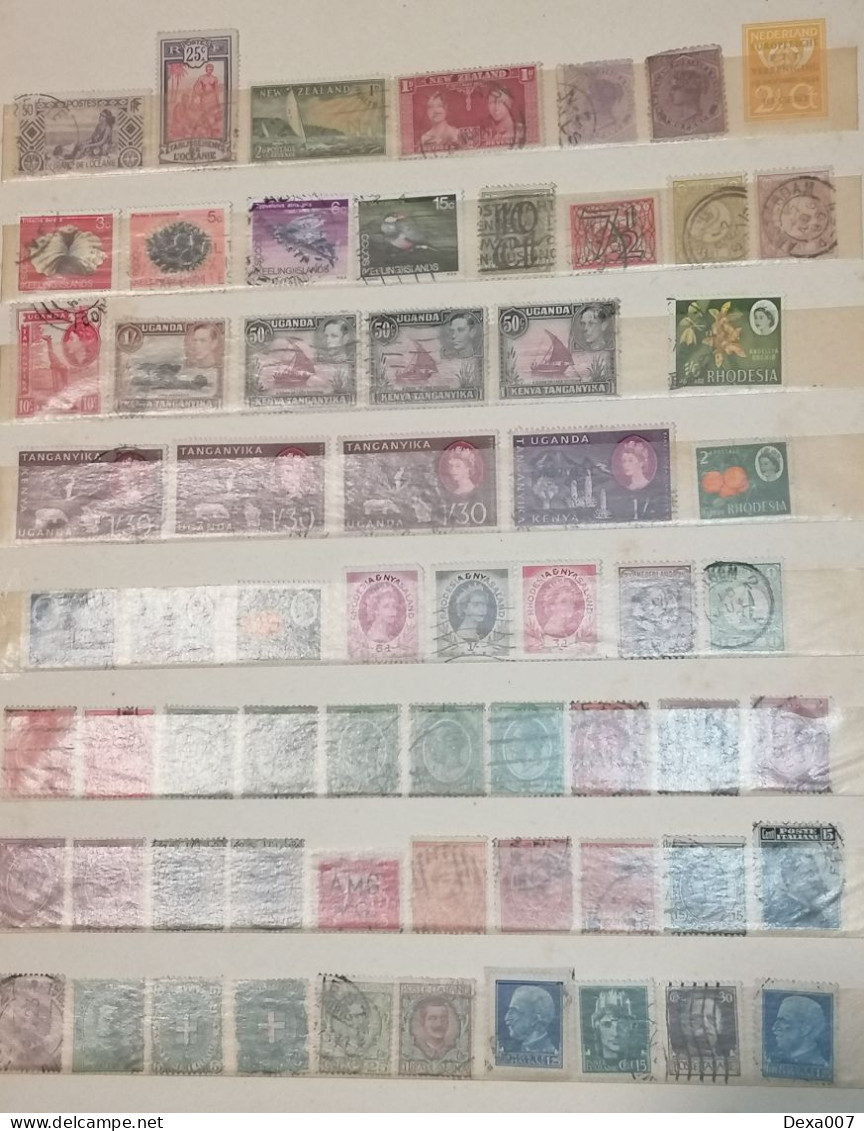 Ancient old album with old stamps Africa, Asia, Europe, America including Egypt, Palestine and colonies used and mint