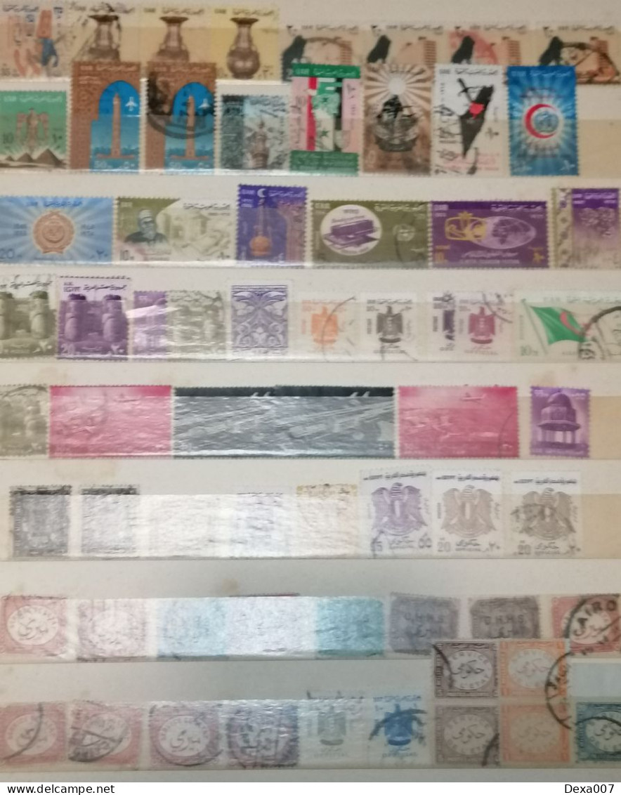 Ancient old album with old stamps Africa, Asia, Europe, America including Egypt, Palestine and colonies used and mint