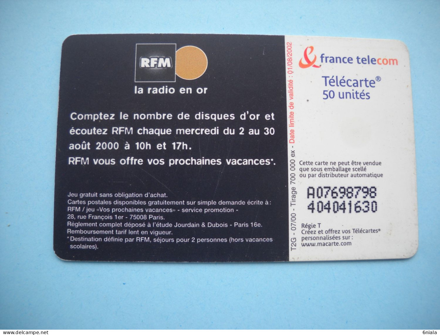 7669 RFM LA RADIO EN OR  LE SOLEIL DONNE  Télécarte Collection  ( 2 Scans)  Carte Téléphonique - Musica