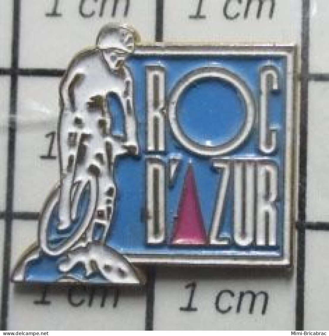 1517  Pin's Pins / Beau Et Rare / SPORTS / CYCLISME VTT ROC D'AZUR Par BADGES IMPACT - Cyclisme